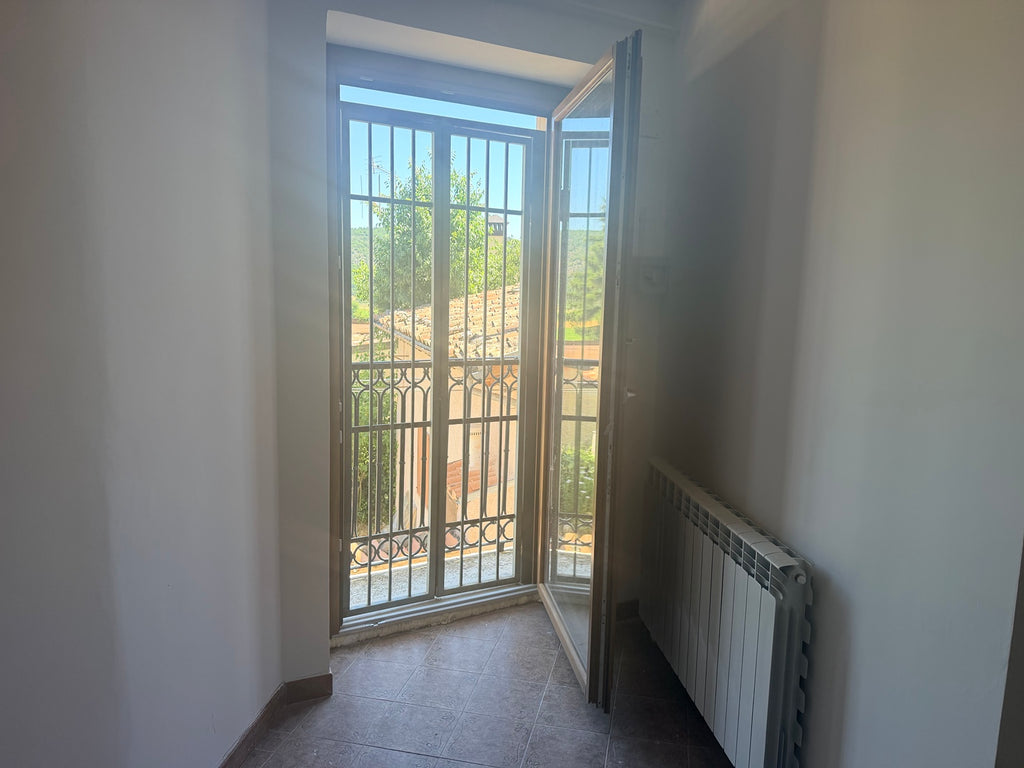 Bilocale in vendita a Caporciano, Via dell'Ospedale - portafinestra